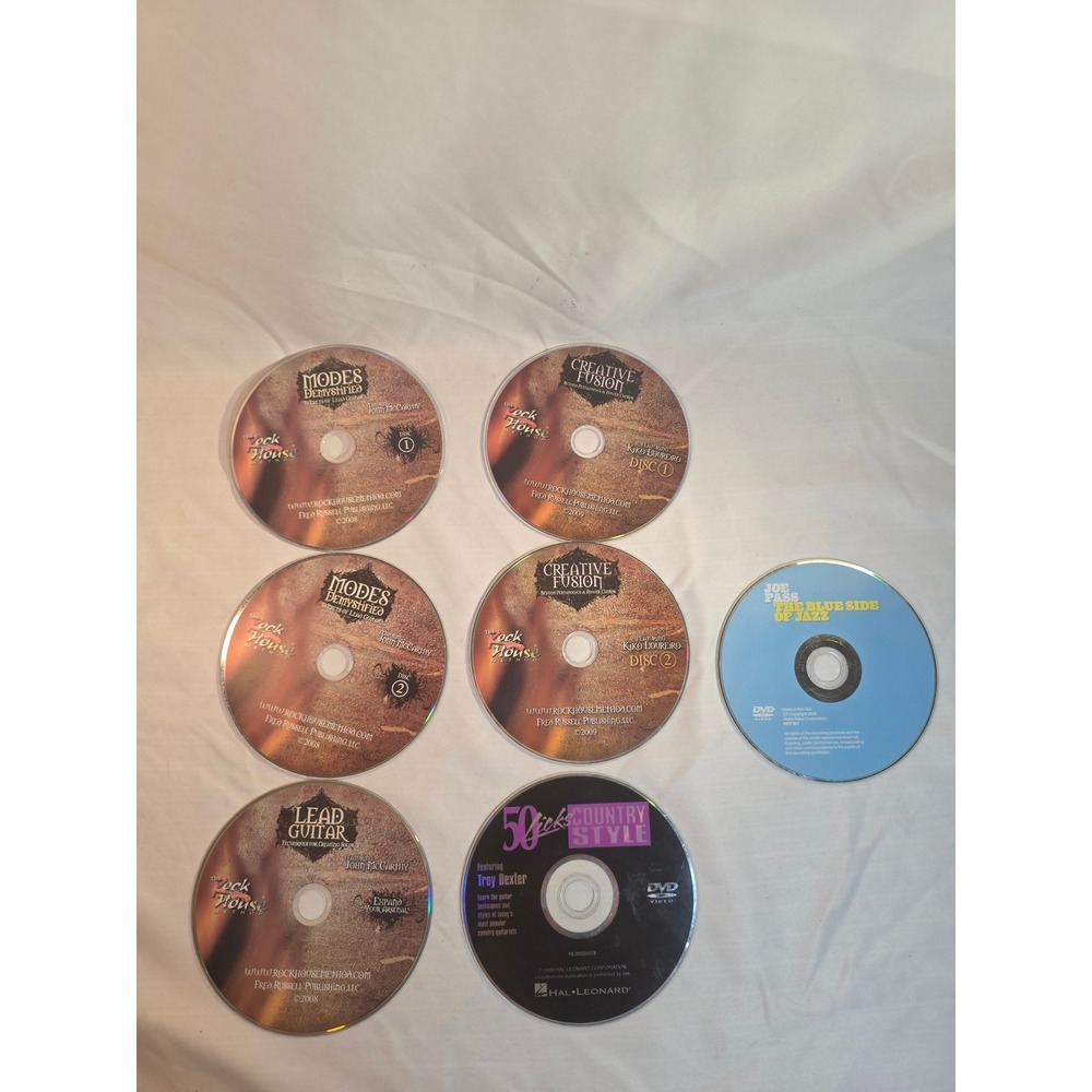 7 Guitar Instructional Loose Discs comes with Camo Northrop Grumman case